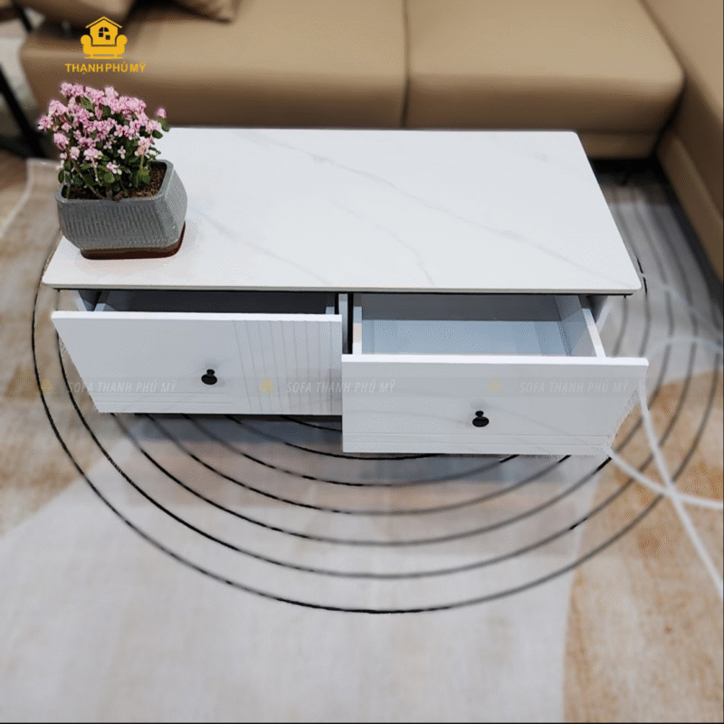 Bàn trà - bàn sofa mặt đá Ceramic hình chữ nhật với 2 học tủ màu trắng đen chủ đạo mang một phong cách tươi trẻ, hiện đại.
