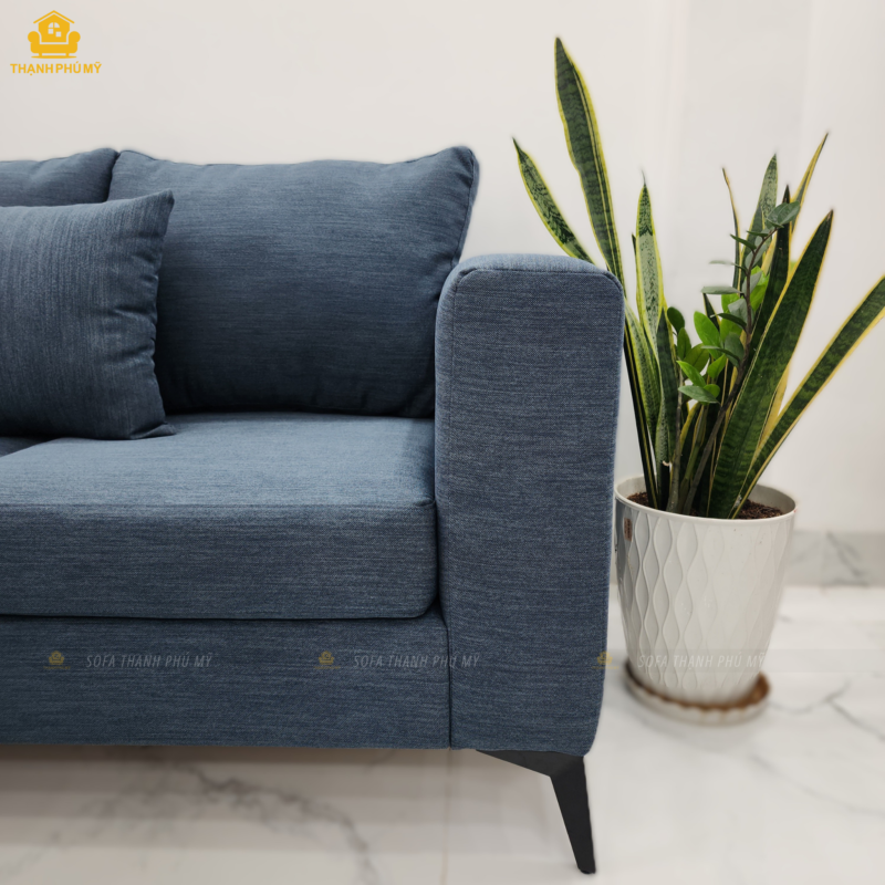 Bộ sofa góc vải Canvas màu xanh denim với phần đệm rời khung và đệm có độ dày 13cm giúp êm hơn, bền hơn.