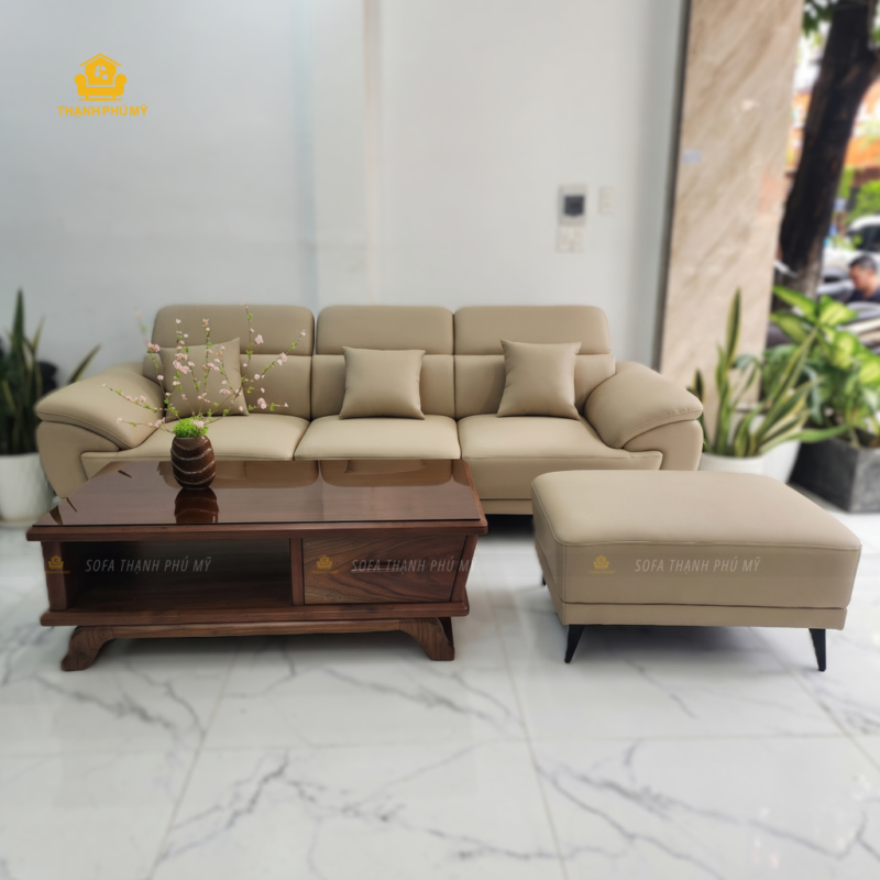 Sofa văng da Microfiber màu be và đôn rời đồng màu nhìn từ góc chéo