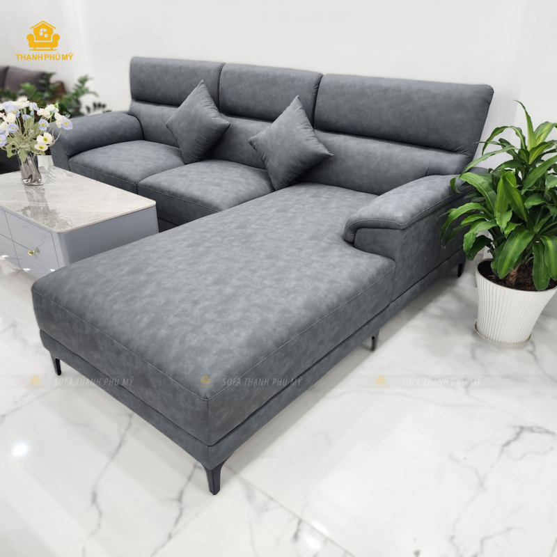 Cận cảnh bề mặt da simili chống thấm nước và độ nảy của đệm mút D40 trên nệm sofa Thạnh Phú Mỹ.