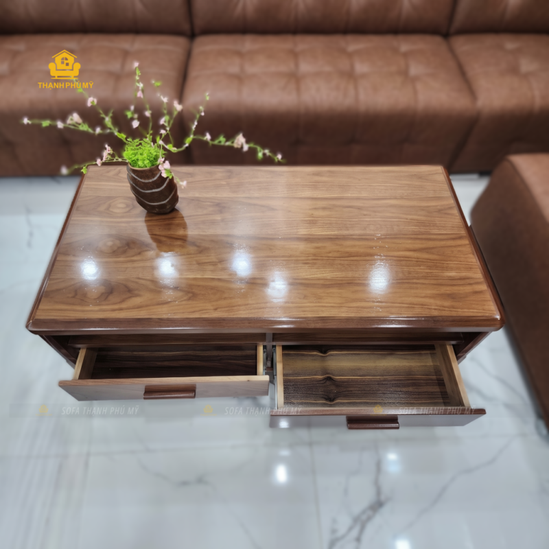 Hai ngăn kéo độc lập giúp phân loại điều khiển, dây sạc và các vật dụng nhỏ thường dùng trong phòng khách.