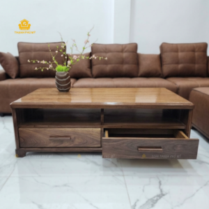 Bàn sofa gỗ Óc Chó kích thước 67 × 127cm với mặt bàn rộng, khoang hở và hai ngăn kéo lưu trữ.