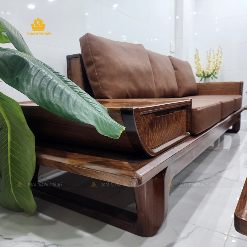 Văng sofa gỗ óc chó dài 2m65 bọc da microfiber nâu kết hợp ngăn kéo tay vịn tinh xảo.