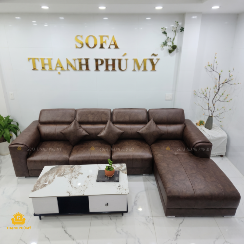 góc chụp chính diện bộ sofa 3m2 x 1m8 góc L màu nâu vân loang kết hợp cùng bàn mặt đá trắng